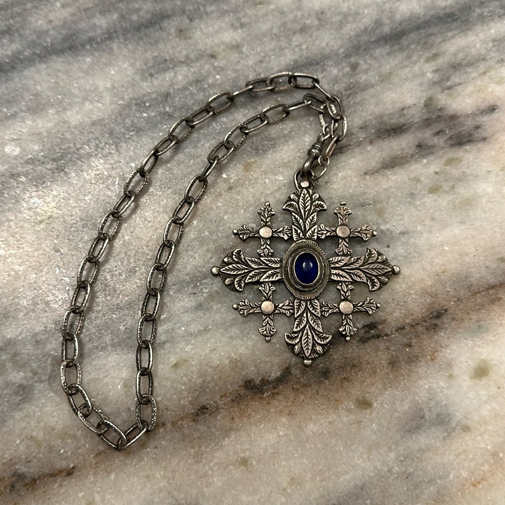 Rough cut sapphire and sterling silver pendant with silver chain